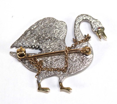 Lot 517 - An 18ct two-colour gold brooch in the form of...