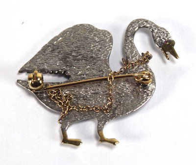 Lot 517 - An 18ct two-colour gold brooch in the form of...