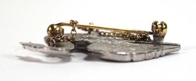 Lot 517 - An 18ct two-colour gold brooch in the form of...