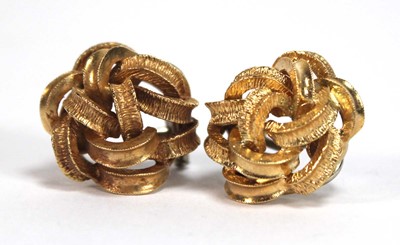 Lot 519 - A pair of 18ct yellow gold ear clips of knot...