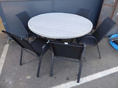 Lot 4156 - Large circular rattan effect garden table with...