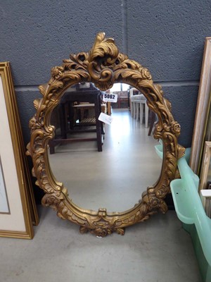 Lot 5062 - (4) Oval mirror in decorative gilt frame
