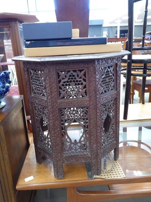 Lot 5107 - Heavily carved Indian side table