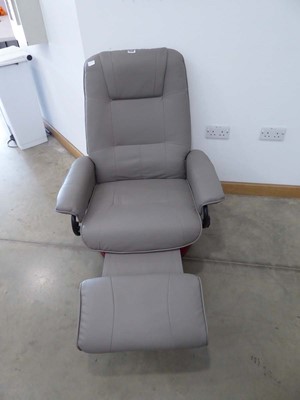Lot 5048 - Grey leather effect swivel reclining armchair