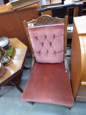 Lot 5162 - Heavily carved button back nursing chair