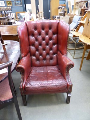 Lot 5255 - Leather wing back armchair
