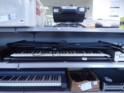 Lot 2209 - Yamaha E213 keyboard with stand