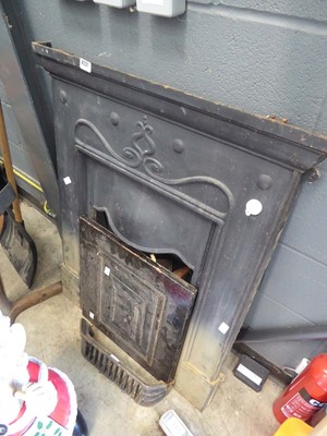 Lot 4231 - Cast iron fire surround with accessories