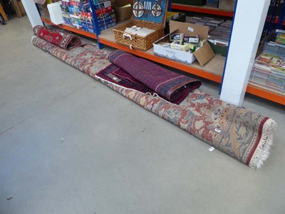 Lot 5422 - Large floral patterned carpet with brown...