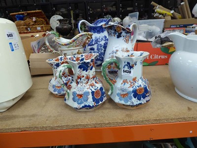 Lot 5430 - Seven floral patterned masons and other jugs