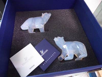Lot 2261 - Pair of Swarovski polar bears, boxed
