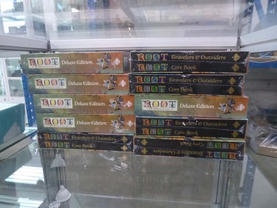 Lot 2307 - 10 sealed copies of the role playing game Root...