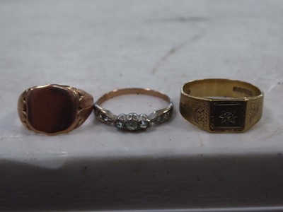Lot 2282 - 2 9ct cygnet rings and a yellow metal ring