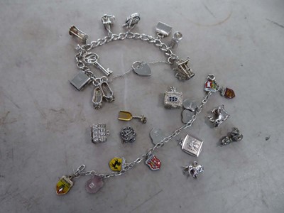 Lot 2297 - Two silver charm bracelets and a selection of...