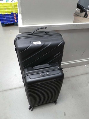 Lot 3231 - Large hard shelled American Tourister suitcase...