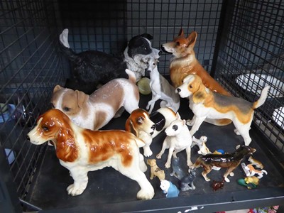Lot 5606 - Cage containing ornamental dog figures
