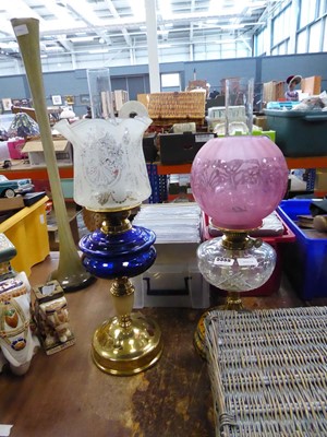 Lot 5555 - 2 brass oil lamps with glass reservoirs and...