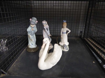Lot 5633 - Cage containing 3 Lladro ladies and swan