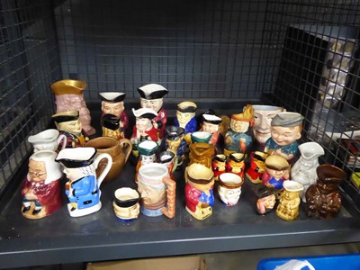 Lot 5593 - Cage of miniature toby jugs