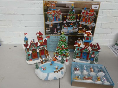 Lot Boxed 13 piece holiday village with lights and...