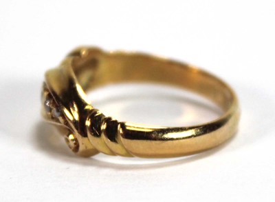 Lot 526 - An 18ct yellow gold ring set five small...