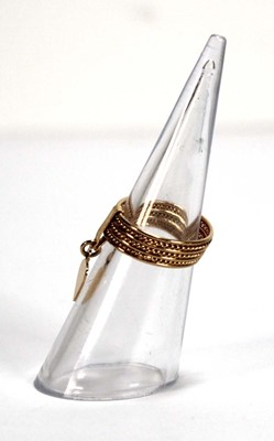 Lot 528 - An 18ct yellow gold seven band ring with heart...