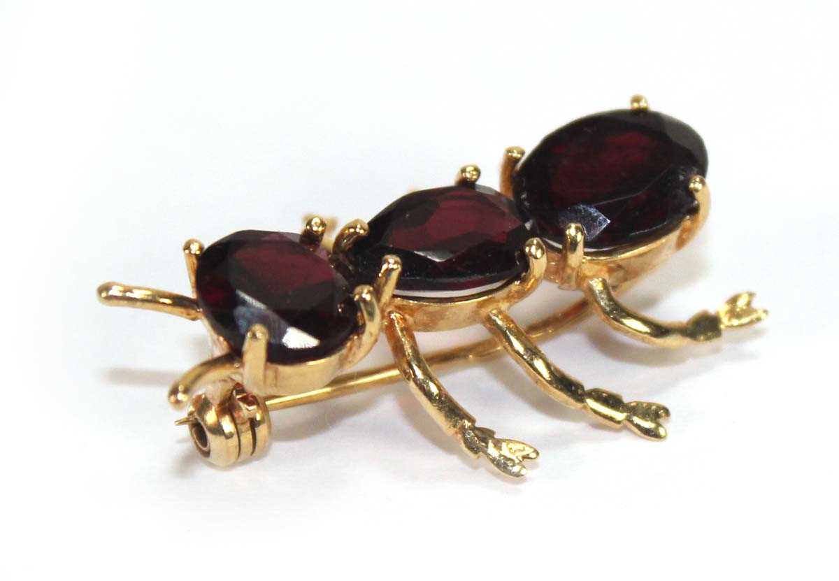 Lot 529 - A yellow metal brooch in the form of an ant...