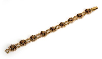 Lot 530 - A yellow metal filigree work bracelet with...