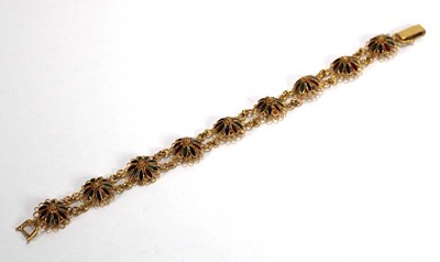 Lot 530 - A yellow metal filigree work bracelet with...
