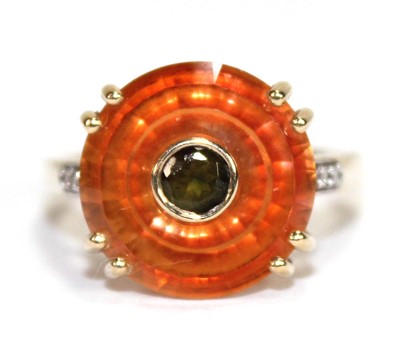 Lot 536 - A 9ct yellow gold Lehrer ring set padparadscha...