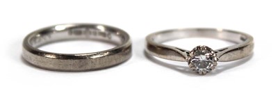 Lot 543 - An 18ct white gold ring set small brilliant...