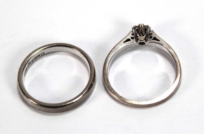 Lot 543 - An 18ct white gold ring set small brilliant...
