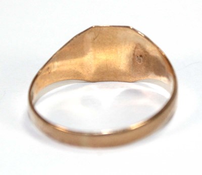 Lot 555 - A 9ct yellow gold signet ring, Birmingham 1979,...