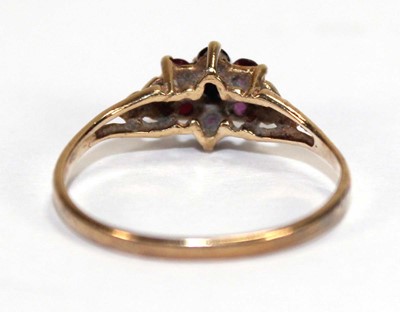 Lot 561 - A 9ct yellow gold cluster ring set small...