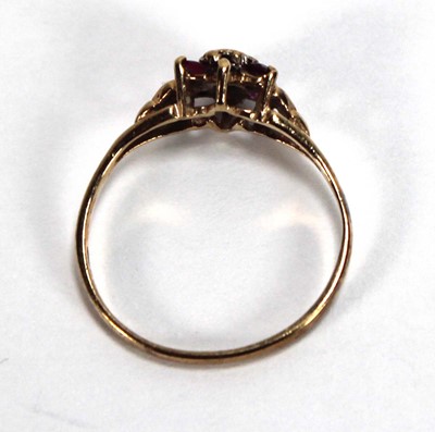 Lot 561 - A 9ct yellow gold cluster ring set small...