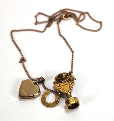 Lot 566 - A 9ct yellow gold fine curblink necklace...