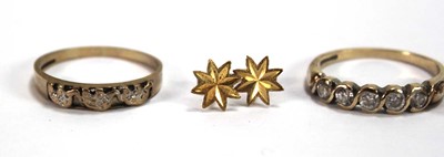 Lot 570 - A 9ct yellow gold half eternity ring set paste,...