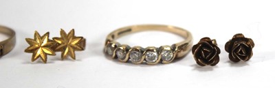 Lot 570 - A 9ct yellow gold half eternity ring set paste,...
