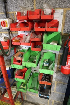 Lot 24 - Wall mounted linbin rack of sundry fixings...