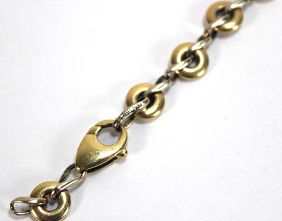 Lot 571 - A Chiampesan two colour gold round link...