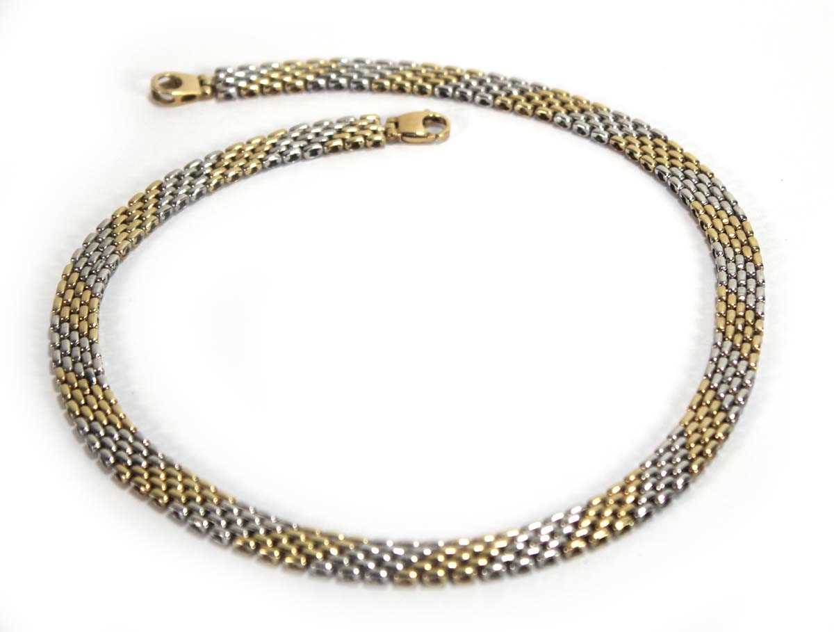 Lot 572 - A 9ct two-colour gold bricklink necklace with...