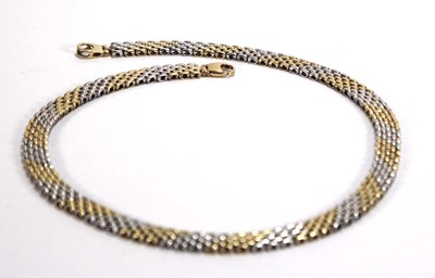 Lot 572 - A 9ct two-colour gold bricklink necklace with...