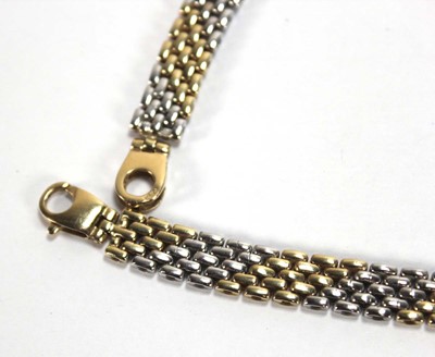 Lot 572 - A 9ct two-colour gold bricklink necklace with...