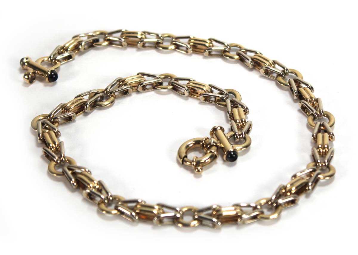 Lot 573 - A 9ct two-colour gold fancy link necklace, the...