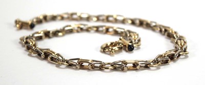 Lot 573 - A 9ct two-colour gold fancy link necklace, the...