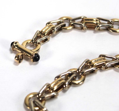 Lot 573 - A 9ct two-colour gold fancy link necklace, the...