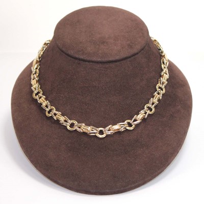 Lot 573 - A 9ct two-colour gold fancy link necklace, the...