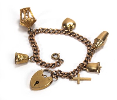 Lot 574 - A 9ct yellow gold curblink bracelet with heart...