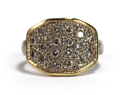 Lot 577 - An 18ct two-colour gold ring pave set eighteen...