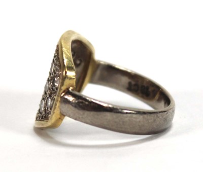 Lot 577 - An 18ct two-colour gold ring pave set eighteen...